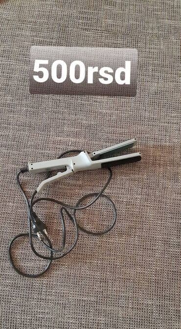 Pegla za kosu (presa) - Električna presa sa kablom označenim 300/500V