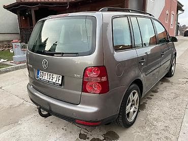 Volkswagen Touran 1.9 TDI, sivi metalik, dizel monovolumen sa petoro