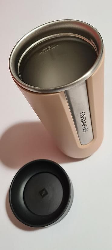 kante za smece: Nespresso Nomad termo putna šolja u krem boji.  - Materijal: Nerđajući — 7