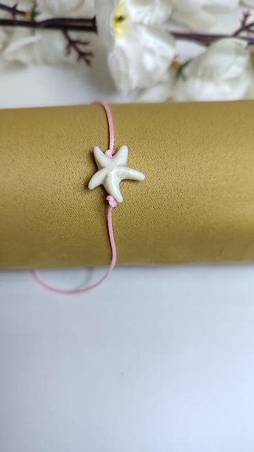 nike revolution 2: Nježna narukvica sa morskom zvijezdom - Dekorativni centralni — 1