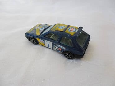 kinder joy harry potter figurice: Burago Lancia Delta S4 crni, Italy,malo izgrebane nalepnice — 2
