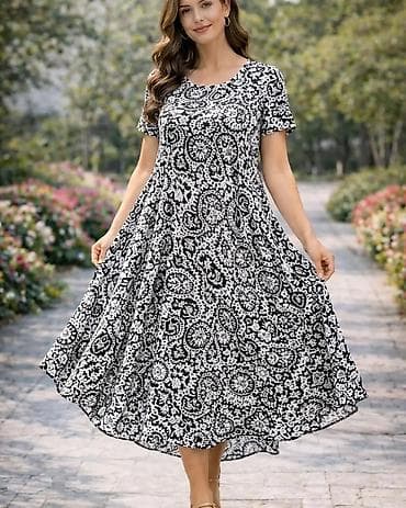Ženska letnja haljina A‑kroja sa kratkim rukavima i bogatim talasastim