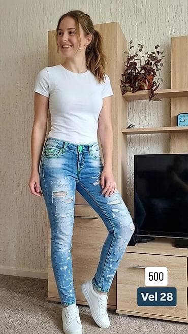 Ženske farmerke – skinny kroj, svetlo plavi denim sa “washed” efektom