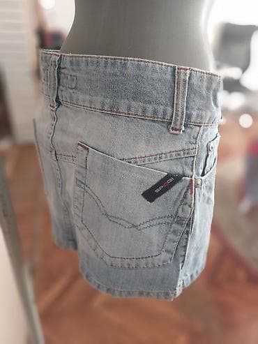 jeans suknje: TEKSAS MINIĆ Svetlo plavi minić sa velikim metalnim dugmetom/kopčom — 2