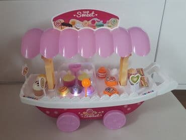 Dečija odeća: Muzicka prodavnica slatkisa. Svira, svetli i moze se voziti — 3