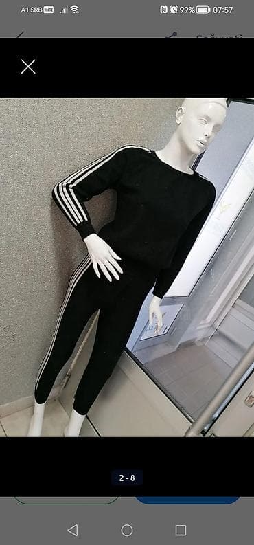 komplet za trening: Ženski sportski komplet – crna dukserica i helanke - Boja: crna - — 3