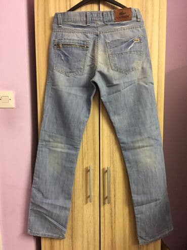 tunika i pantalone: Farmerke od svetlijeg teksasa, ravnog kroja, nikad nosene. Br. 30 — 2