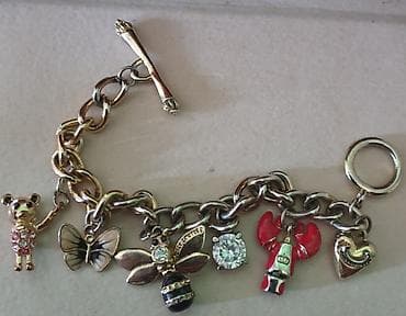 Original juicy couture narukvica sa dosta privezaka. Duzina 21 cm na lalafo.rs Original juicy couture narukvica sa dosta privezaka. Duzina 21 cm