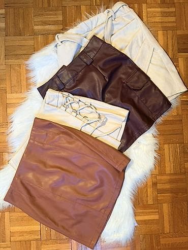 Set mini suknji – 4 komada - Materijali: veštačka koža (tri modela) i