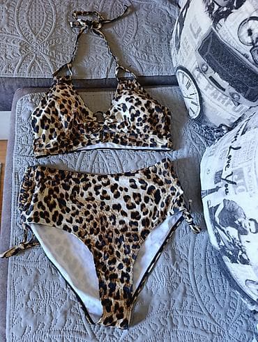 Dvoddelni kupaći kostim sa leopard printom - Gornji deo: trokutasti na lalafo.rs Dvoddelni kupaći kostim sa leopard printom - Gornji deo: trokutasti