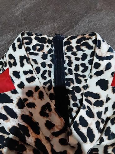 men: Ženske pantalone sa animal printom (leopard) i crvenim bočnim trakama — 2