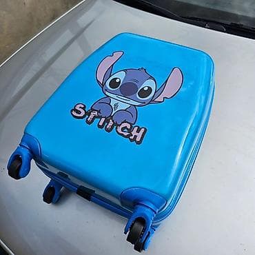 gumene pertle za patike: Decji kofer stitch Cena: 4200 din Dečiji koferi pretvaraju putovanja — 3