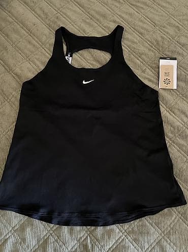 Lične stvari: Nike Pro Women's Dri-FIT Tank Top vel. S, M 
Recycled Materials
IB — 6