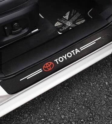 adapter za auto upaljač sa 220v na 12v: Stikeri za prag automobila - karbon TOYOTA Stikeri za prag automobila — 2