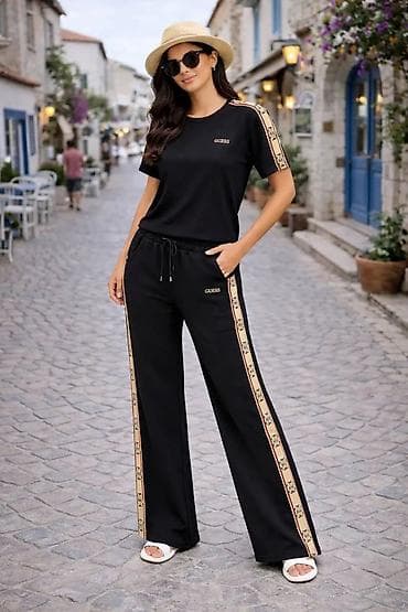 torbe mona: Damski dvodelni komplet – majica i pantalone sa širokim nogavicama — 3