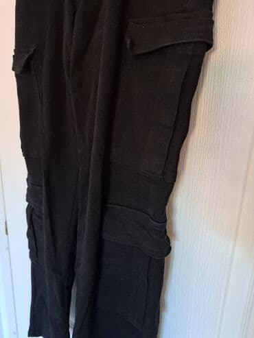 srebrne ogrlice sa cirkonima: Crne pantalone sa džepovima. Pantalone imaju praktične džepove sa obe — 5