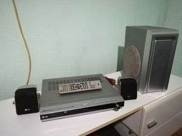 lg flatron l1942se: LG DAV-DZ20 kućni bioskop sistem. Uključuje DVD plejer/risiver, dva — 1