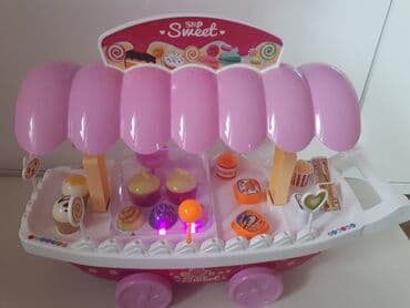 Dečija odeća: Muzicka prodavnica slatkisa. Svira, svetli i moze se voziti — 2