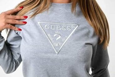 tech fleece zuti: Ženska dukserica žute boje sa dugim rukavima i okruglim izrezom — 25