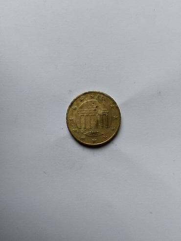 Muzički instrumenti: 10 Euro centi 2002 A Germany 1 novčić i 2002 D Germany 2 novčića.Jedan — 5