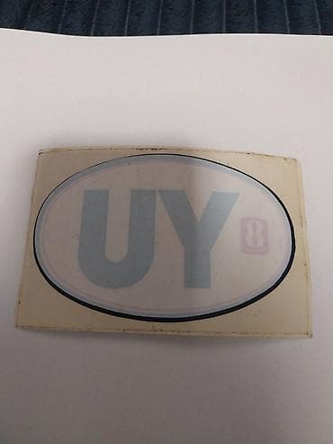 tepisi za auto: Nalepnica „UY8” – ovalna, sa velikim slovima „UY” u — 1