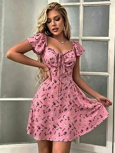 roze perika: Haljina s printom A-kroja sarena. - Model kratki rukavi s blagim puf — 7