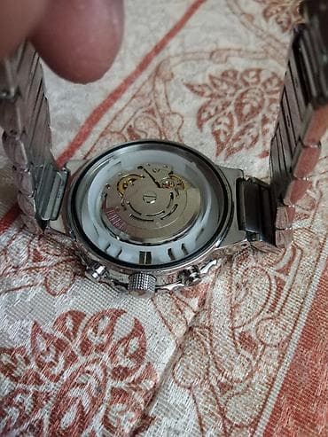 calypso satovi: TCM chronograph - automatic Sat radi, posle 8-10 sati pracenja — 2