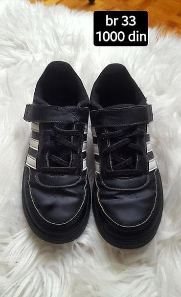 duboke converse patike: Dečije patike broj 33. Crne sa belim prugama, klasičan sportski — 1