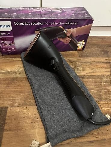 ploom u leskovac: Philips vertikalna pegla Steam&Go Plus ručni parni uređaj za odeću — 7