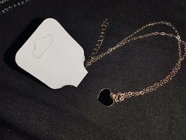 Zlatno obojena ogrlica sa privjeskom u obliku srca ik - Elegantna