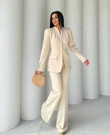 elegantni kompleti sa pantalonama: Elegantno žensko odelo u više boja, sa sakoom i pantalonama. Sako ima — 6