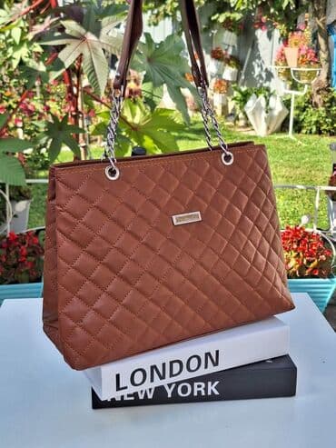 tommy hilfiger d: Prelepi modeli ženskih torbi
Cena 2500 din — 11