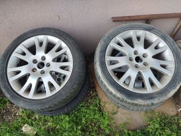 kuciste kljuca opel corsa c: Renault Laguna karavan, srebrne boje, sa krovnim nosačima. Poseduje — 5