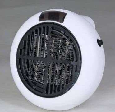 daljinski za kapiju: Mini grejalica na daljinski 1000W Mini grejalica na daljinski 1000 W — 2