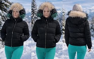 Ženska crna pufnasta jakna, idealna za hladnije vreme. Jakna ima
