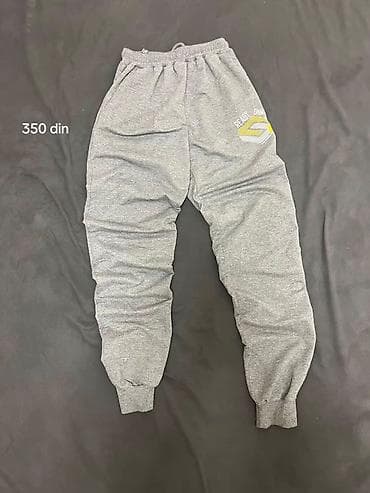 Sive trenerka donji deo sa elastinom – udoban i praktičan model za