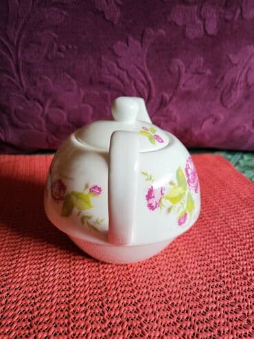 Čajnici: Bokalcic nov porcelanski. Bokal. Visina. 9cm. Duzina celog — 4