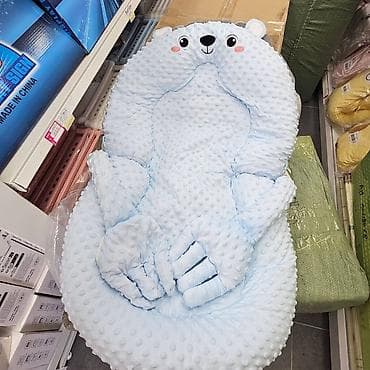 Gnezdo za bebe sa funkcijom umirivanja (poznato i kao prenosivi jastuk