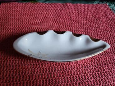 Stare vaze i dekor: Pepeljara nova Jugoporcelan. 70te. Visina. 2cm. Duzina. 16cm — 2