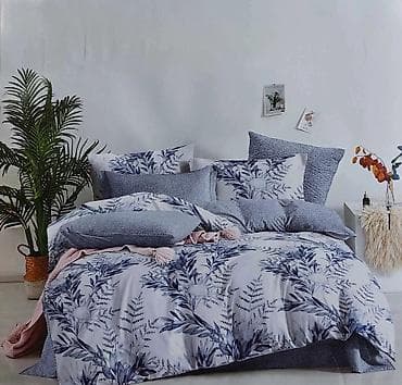 Komplet posteljine koji uključuje navlaku za jorgan i jastučnice