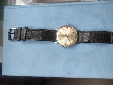 Donji delovi trenerke: Rucni muski sat Darwil,vrlo star,ispravan,radi — 1