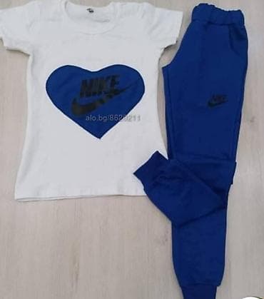 zenski satovi do 3000 dinara: Ženski sportski komplet majica i donji deo trenerke sa dzepovima. Bela — 3