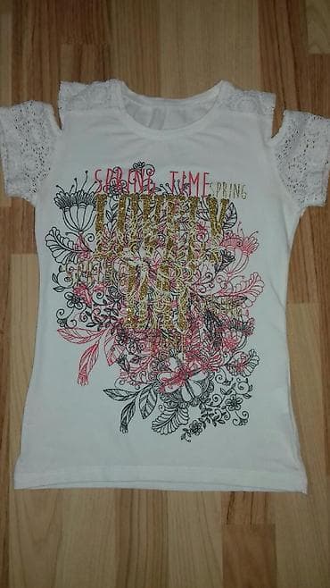 Prelepa majca,gola ramena. Bez ikakvih ostecenja. Velicina 10