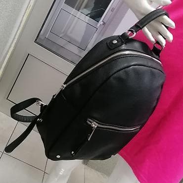 Crni ženski ranac – kompaktan i praktičan svakodnevni model. - na lalafo.rs Crni ženski ranac – kompaktan i praktičan svakodnevni model. -