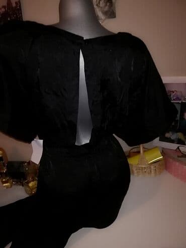 Nov sa etiketom Konbinezon 40broj U struku sami strukirate Otvor