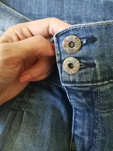 Swimsuits: Teksas suknja L. Piše da je veličina 32. Odgovara otprilike L — 4