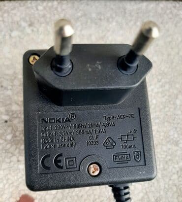 Kablovi i adapteri: Punjač Nokia ACP-7E ispravan ulaz 230V, 50Hz/21mA/4,8VA, izlaz 3,7V