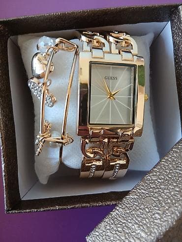 Jewellery sets: Elegantni ženski set – sat i narukvice - Brend: Guess (sat) - Dizajn — 1