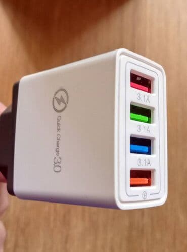 polovan ps4 cena: Nov punjač za mobilni telefon Quick Charge 3.0 sa četiri USB ulaza — 6