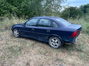 rude za prikolice: Opel Vectra B, model sedan, u tamnoplavoj boji. Vozilo ima — 1